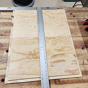 Cabinet Sides placed front edge to front edge for layout of slides and shelf supports. 